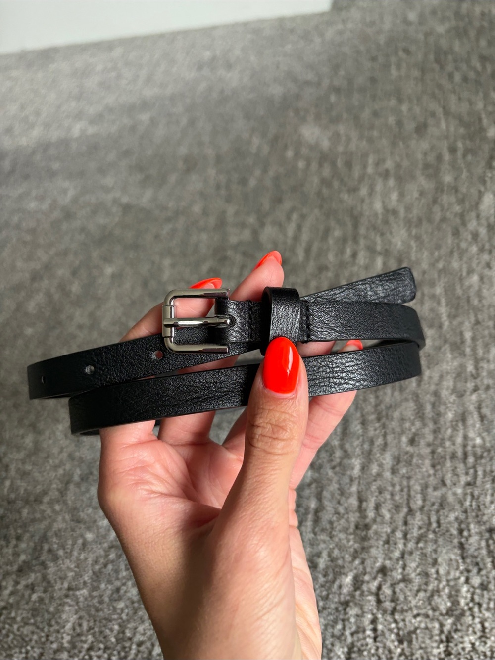 Black faux leather belt